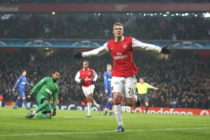 Framed Print : Bendtner's Brilliant Goal: Arsenal Takes 2-1 Lead Over Steaua Bucuresti in Champions League