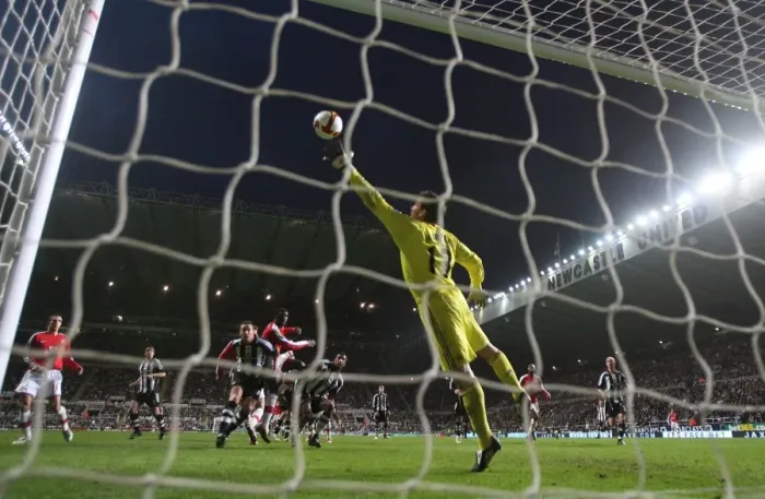 Framed Print : Bendtner's Epic Leap: The First Arsenal Goal vs. Newcastle, 2009