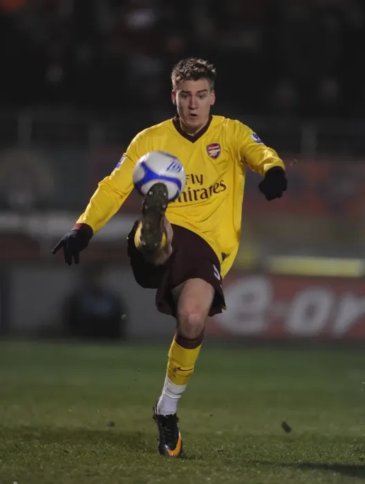 Framed Print : Bendtner's FA Cup Battle: Leyton Orient vs. Arsenal (2011)