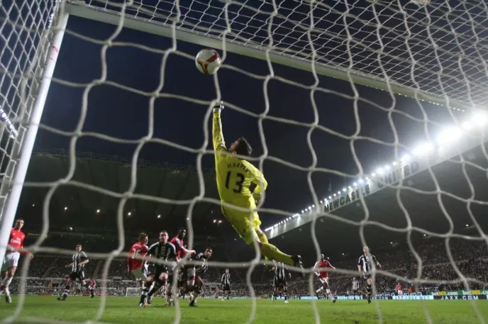 Framed Print : Bendtner's Thrilling Header: Arsenal Takes the Lead Over Newcastle (3:1)