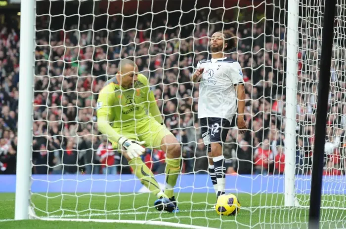 Framed Print : Beniot Assou-Ekotto (Tottenham) is dejected as Heurelho Gomes picks the ball out of the net following Samir Nasris strike for the 1st Arsenal goal. Arsenal 2: 3 Tottenham Hotspur. Baclays Premier League. Emirates Stadium, 20  /  11  /  10. Credit : Arsenal Football Club  / 