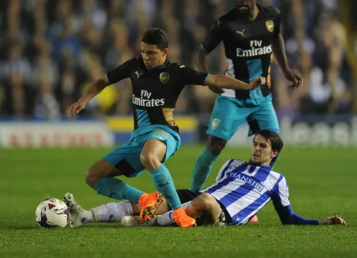 Framed Print : Bennacer vs. Hutchinson: A Battle in the Capital One Cup Clash Between Arsenal and Sheffield Wednesday Framed Print : Bennacer vs. Hutchinson: A Battle in the Capital One Cup Clash Between Arsenal and Sheffield Wednesday