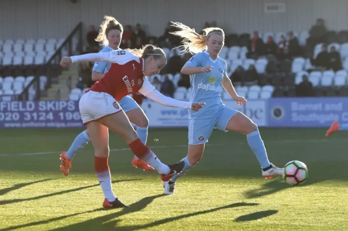 Framed Print : Beth Mead vs. Hayley Sharp: Intense Moment in Arsenal Women vs. Sunderland AFC Ladies WSL Match