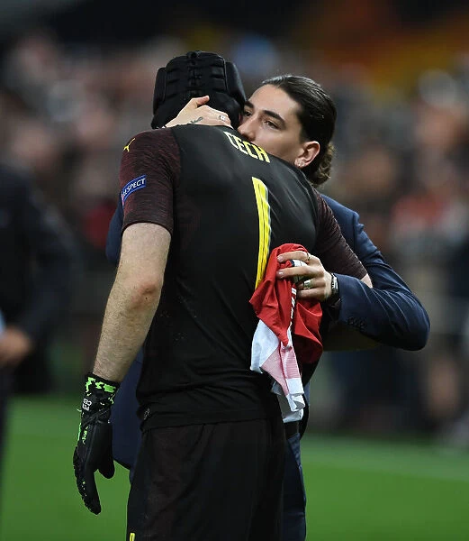 Bittersweet End: Cech Comforted by Bellerin after Arsenal's Europa League Defeat