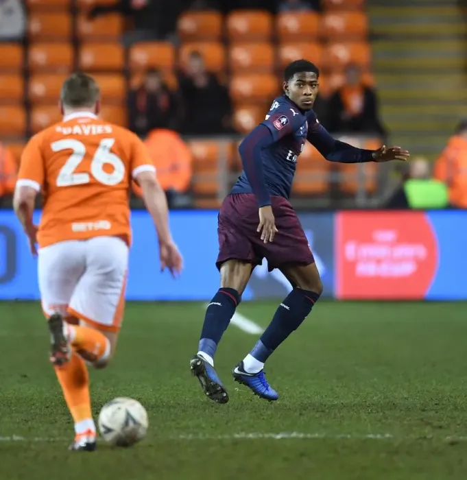Framed Print : Blackpool vs Arsenal: FA Cup Third Round Clash - Zech Medley Marks Steven Davies