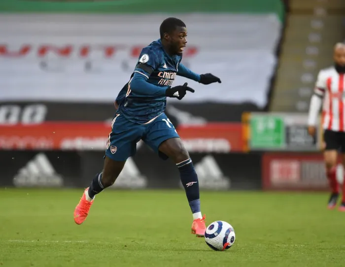 Framed Print : Empty Bramall Lane: Nicolas Pepe of Arsenal in Premier League Clash Amidst COVID-19 Restrictions Framed Print : Empty Bramall Lane: Nicolas Pepe of Arsenal in Premier League Clash Amidst COVID-19 Restrictions