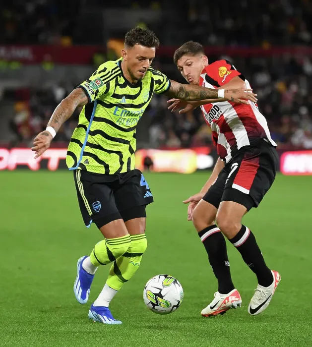 Framed Print : Brentford vs Arsenal: Carabao Cup Clash - White vs Janelt Battle