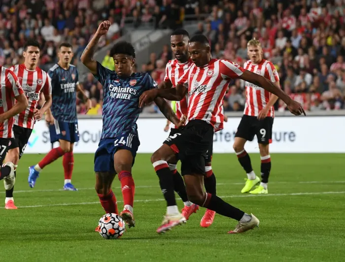 Framed Print : Brentford vs Arsenal: Nelson vs Pinnock Clash in Premier League Showdown