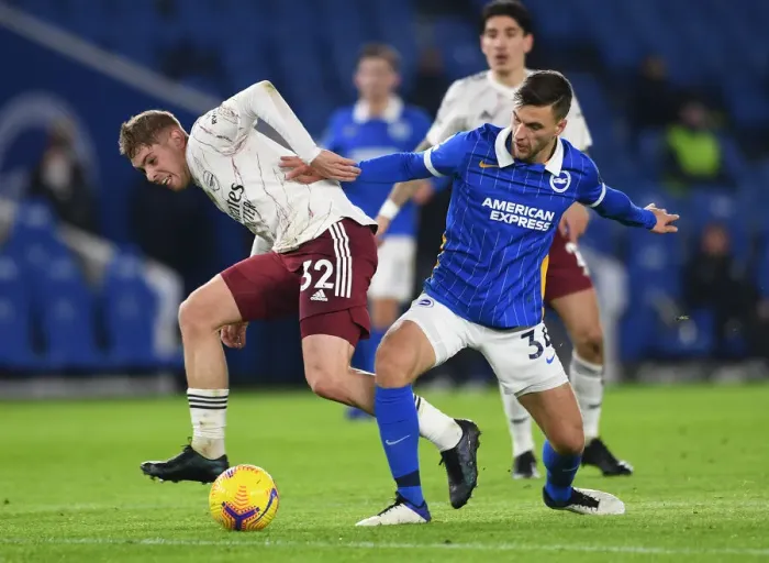 Framed Print : Brighton vs. Arsenal: Emile Smith Rowe Faces Off Against Joel Veltman in Premier League Clash