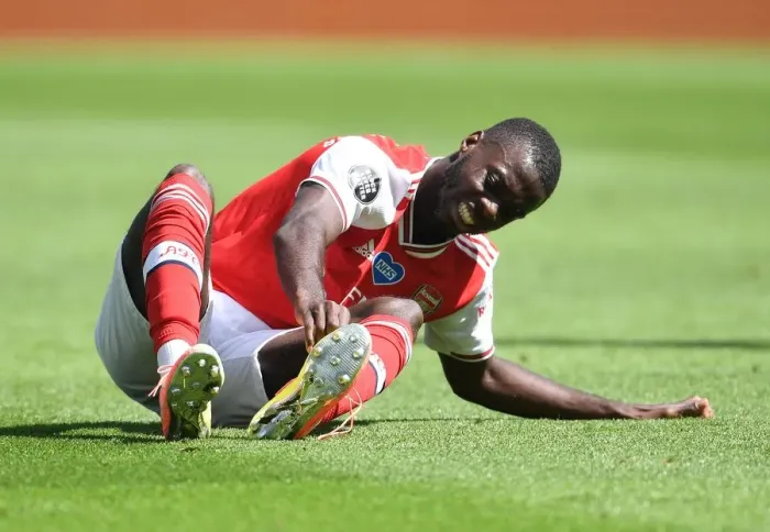 Framed Print : Brighton vs. Arsenal: Pepe Suffers Injury in Empty Premier League Clash (2020) Framed Print : Brighton vs. Arsenal: Pepe Suffers Injury in Empty Premier League Clash (2020)