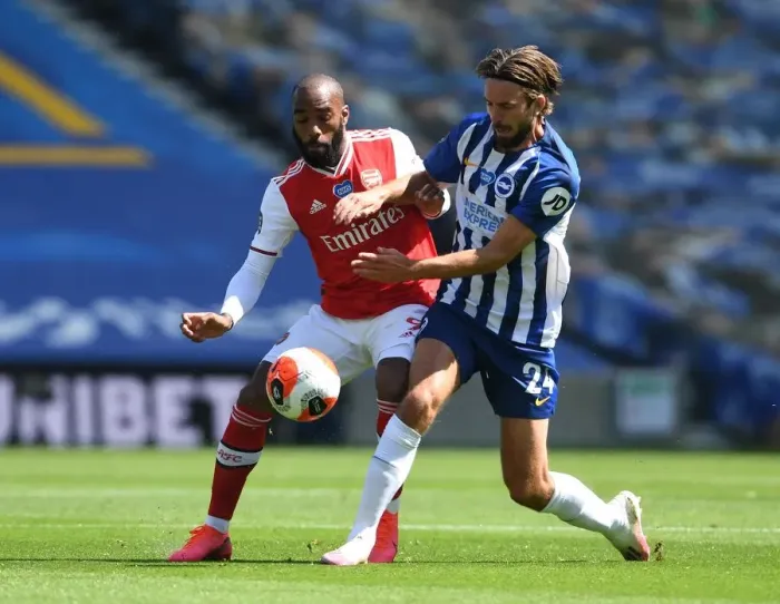 Framed Print : Brighton vs. Arsenal: Empty Stadium Clash in Premier League Amidst Coronavirus Pandemic - Lacazette vs. Propper Framed Print : Brighton vs. Arsenal: Empty Stadium Clash in Premier League Amidst Coronavirus Pandemic - Lacazette vs. Propper