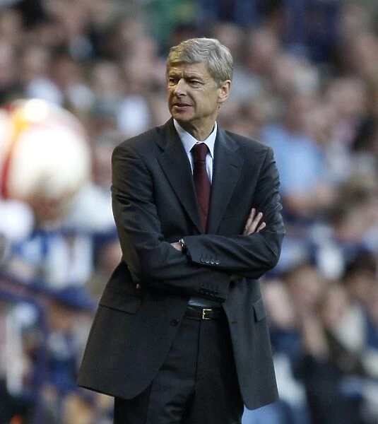 Britain Soccer. Arsenals manager Arsene Wenger is seen as his team win