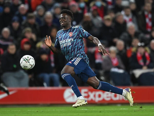 Bukayo Saka in Action: Arsenal vs. Liverpool - Carabao Cup Semi-Final at Anfield