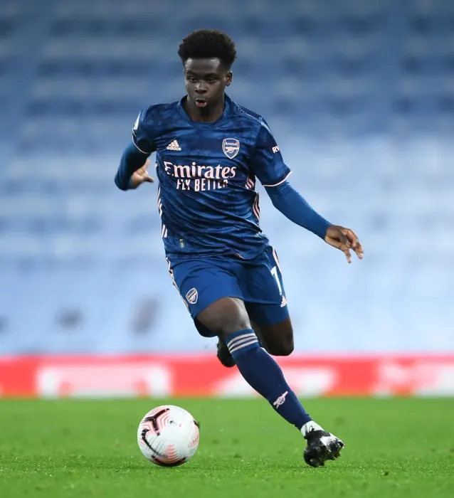 Framed Print : Bukayo Saka in Action: Manchester City vs. Arsenal, Premier League 2020-21 (Behind Closed Doors) Framed Print : Bukayo Saka in Action: Manchester City vs. Arsenal, Premier League 2020-21 (Behind Closed Doors)