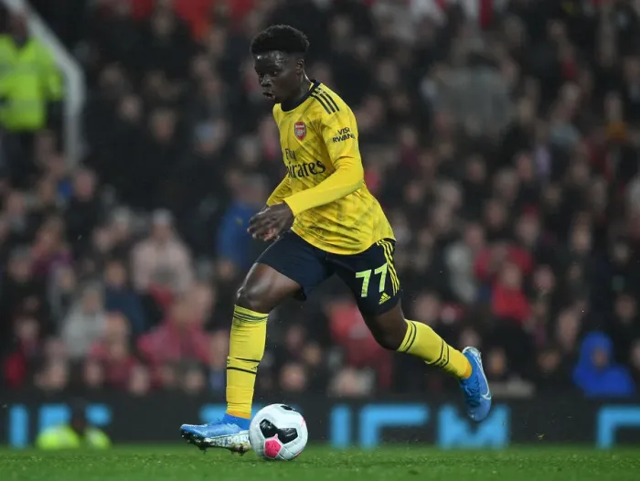 Framed Print : Bukayo Saka in Action: Manchester United vs. Arsenal, Premier League 2019-20 Framed Print : Bukayo Saka in Action: Manchester United vs. Arsenal, Premier League 2019-20