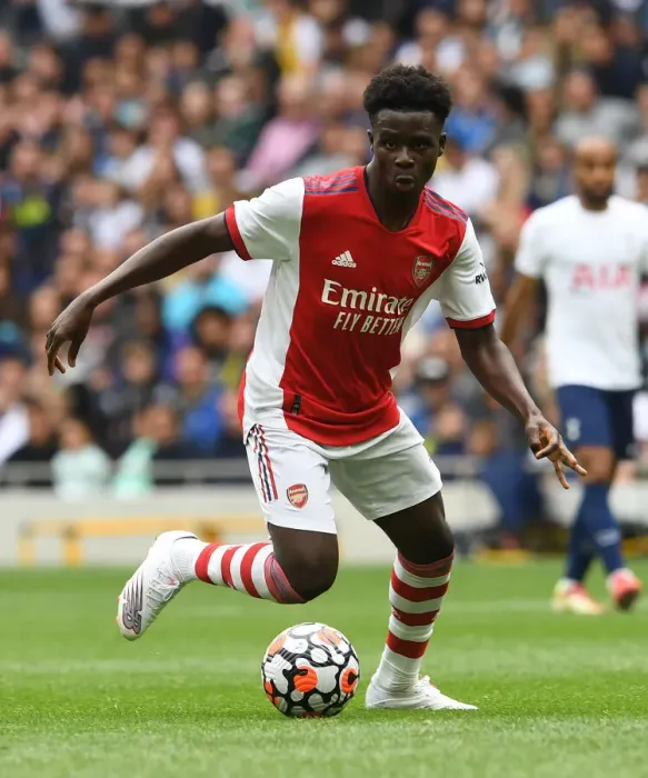 Framed Print : Bukayo Saka in Action: Tottenham vs. Arsenal - The Mind Series: A Football Battle in London