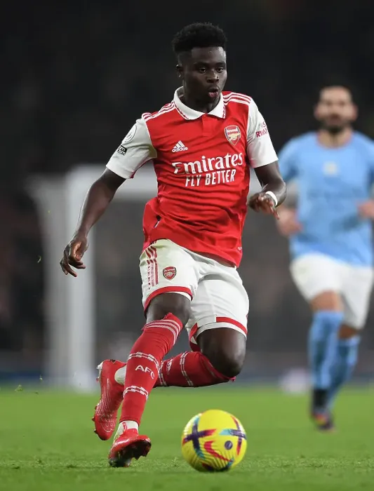 Framed Print : Bukayo Saka: Arsenal Star Shines in Premier League Clash Against Manchester City