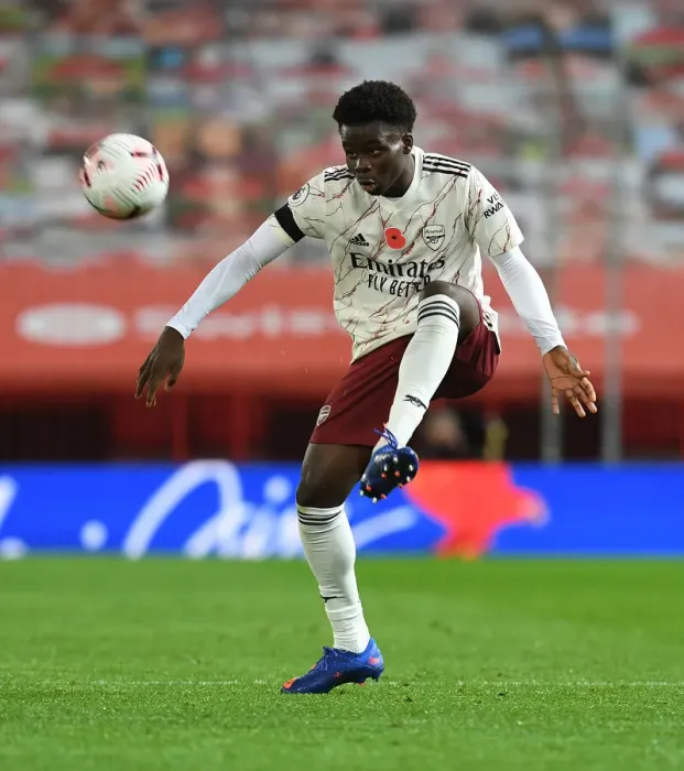 Framed Print : Bukayo Saka: Arsenal's Radiant Star Shines at Old Trafford Amidst Empty Seats, Manchester United vs. Arsenal, 2020-21 Premier League Framed Print : Bukayo Saka: Arsenal's Radiant Star Shines at Old Trafford Amidst Empty Seats, Manchester United vs. Arsenal, 2020-21 Premier League