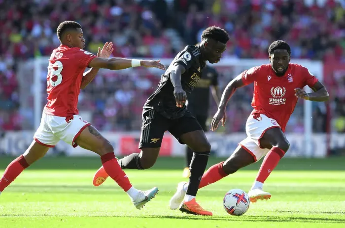 Framed Print : Bukayo Saka Charges Forward: Nottingham Forest vs. Arsenal FC, Premier League 2022-23