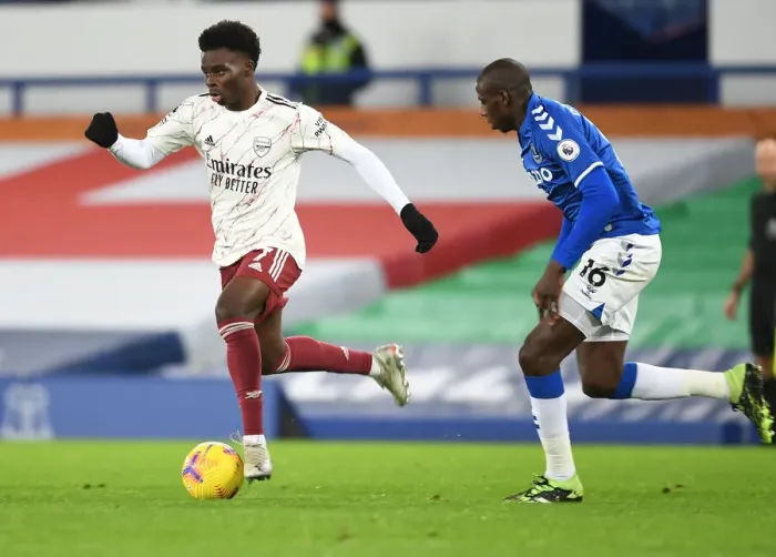 Framed Print : Bukayo Saka Dashes Past Everton's Yerry Mina: Everton vs Arsenal, Premier League 2020-21 Framed Print : Bukayo Saka Dashes Past Everton's Yerry Mina: Everton vs Arsenal, Premier League 2020-21