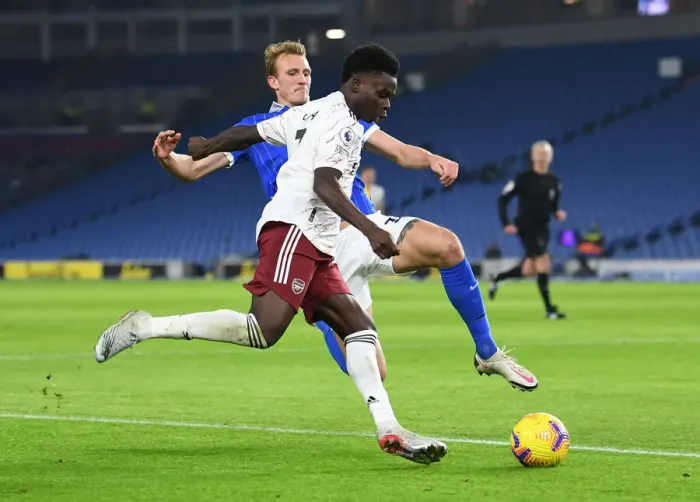Framed Print : Bukayo Saka Faces Off Against Dan Burn: Brighton vs. Arsenal, Premier League 2020-21