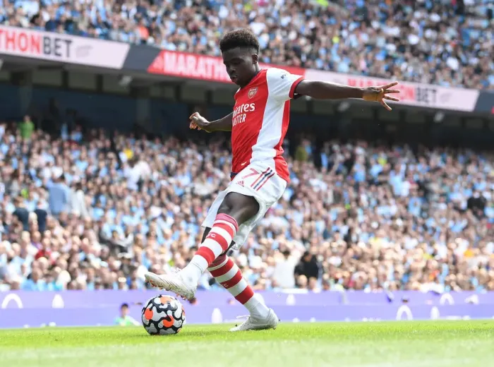Framed Print : Bukayo Saka Faces Off Against Manchester City: Premier League Clash Framed Print : Bukayo Saka Faces Off Against Manchester City: Premier League Clash