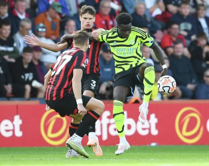 Framed Print : Bukayo Saka Faces Off Against Milos Kerkez in AFC Bournemouth vs Arsenal FC Premier League Clash (2023-24) Framed Print : Bukayo Saka Faces Off Against Milos Kerkez in AFC Bournemouth vs Arsenal FC Premier League Clash (2023-24)