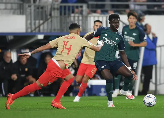 Framed Print : Bukayo Saka Faces Off Against RC Lens: Arsenal's Champions League Battle
