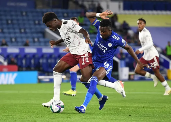 Framed Print : Bukayo Saka Fouled by Amartey: Leicester vs Arsenal Carabao Cup Showdown