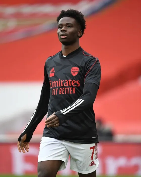 Framed Print : Bukayo Saka Gears Up for Arsenal vs. Tottenham at Empty Emirates Stadium