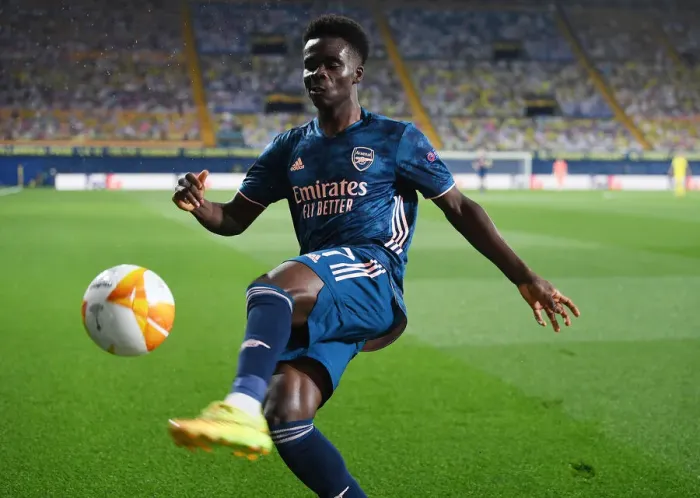 Framed Print : Bukayo Saka Leads Arsenal in Europa League Semi-final Against Villarreal, Spain (2020-21): A Lone Warrior Amidst Empty Stands