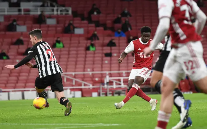 Framed Print : Bukayo Saka Scores Arsenal's Second Goal Against Newcastle United in Empty Emirates Stadium (2020-21) Framed Print : Bukayo Saka Scores Arsenal's Second Goal Against Newcastle United in Empty Emirates Stadium (2020-21)