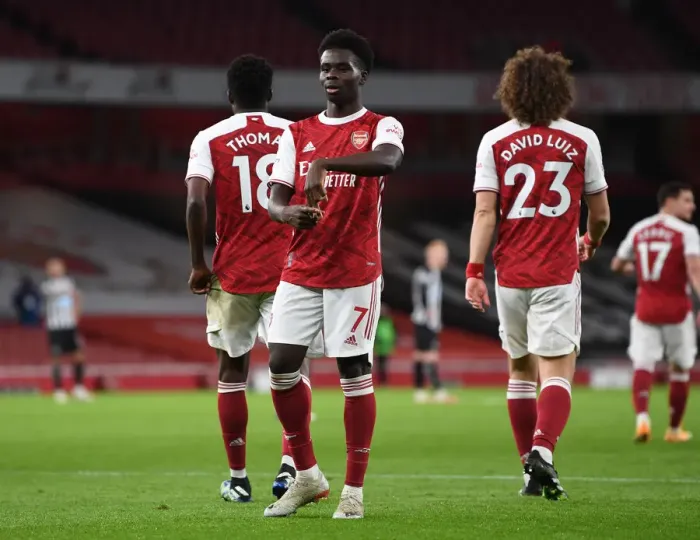 Framed Print : Bukayo Saka Scores Emptied Emirates Stadium's Second Goal Against Newcastle United, Premier League 2020-21