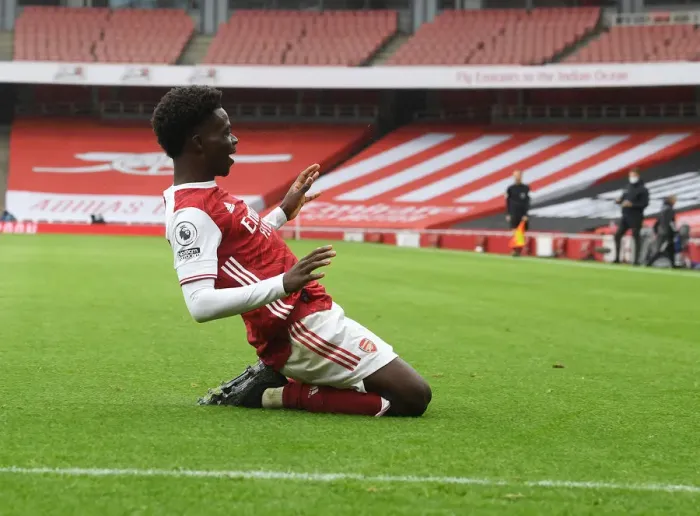 Framed Print : Bukayo Saka Scores First Goal in Empty Emirates: Arsenal's Historic Victory over Sheffield United in the 2020-21 Premier League