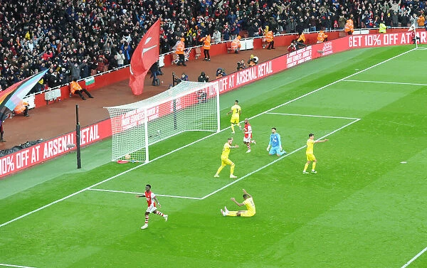 Bukayo Saka Scores His Second Goal: Arsenal's Victory Over Brentford in the 2021-22 Premier League