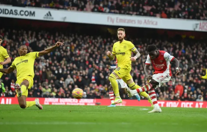 Framed Print : Bukayo Saka Scores His Second Goal: Arsenal's Victory Over Brentford in the 2021-22 Premier League Framed Print : Bukayo Saka Scores His Second Goal: Arsenal's Victory Over Brentford in the 2021-22 Premier League