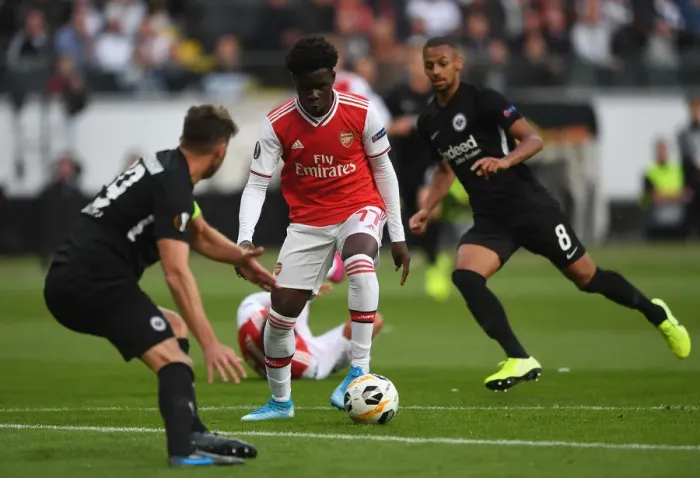 Framed Print : Bukayo Saka Shines: Arsenal's Standout Performance vs. Eintracht Frankfurt in UEFA Europa League 2019-20 Framed Print : Bukayo Saka Shines: Arsenal's Standout Performance vs. Eintracht Frankfurt in UEFA Europa League 2019-20