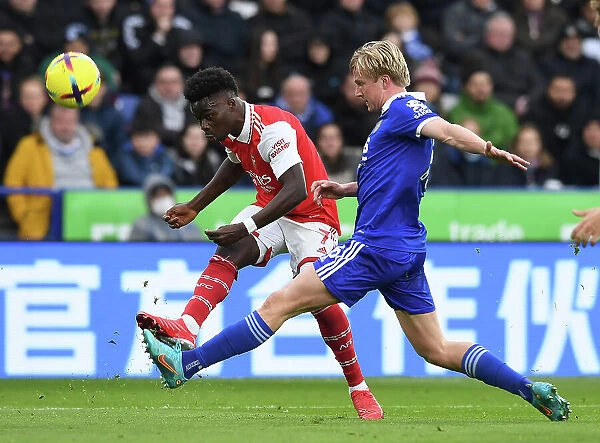 Bukayo Saka Tackled by Victor Kristiansen: Leicester City vs. Arsenal FC, Premier League 2022-23