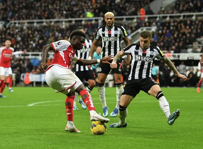 Framed Print : Bukayo Saka Takes on Kieran Trippier: Intense Battle at St. James Park - Arsenal vs Newcastle United (2023-24) Framed Print : Bukayo Saka Takes on Kieran Trippier: Intense Battle at St. James Park - Arsenal vs Newcastle United (2023-24)