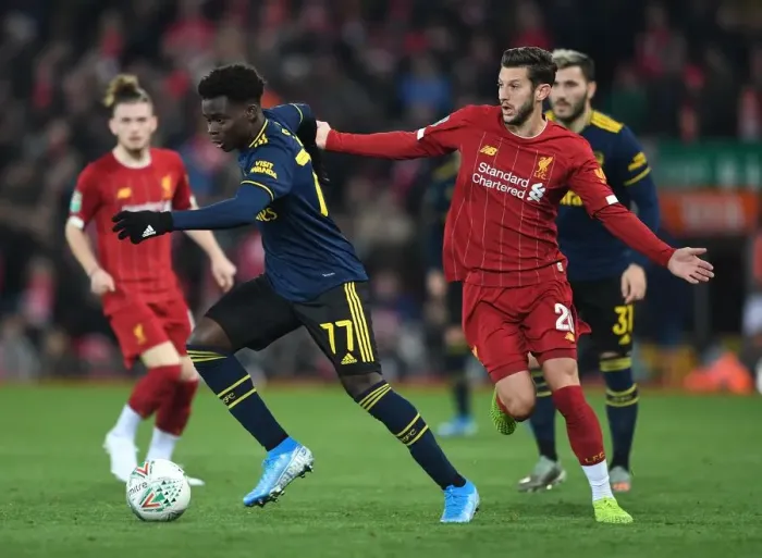 Framed Print : Bukayo Saka vs. Adam Lallana: Carabao Cup Showdown - Liverpool vs. Arsenal Framed Print : Bukayo Saka vs. Adam Lallana: Carabao Cup Showdown - Liverpool vs. Arsenal
