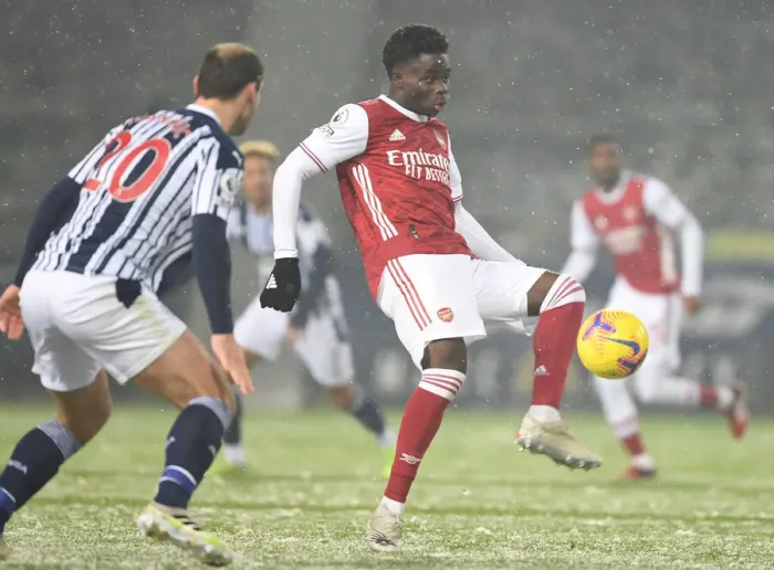 Framed Print : Bukayo Saka vs Branislav Ivanovic: A Battle in the Premier League - West Bromwich Albion vs Arsenal (January 2021)