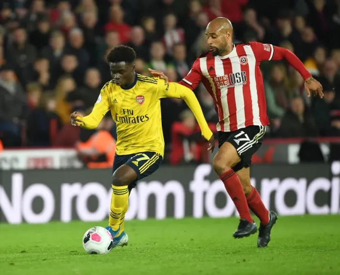 Framed Print : Bukayo Saka vs. David McGoldrick: Clash at Bramall Lane - Sheffield United vs. Arsenal, Premier League 2019-20