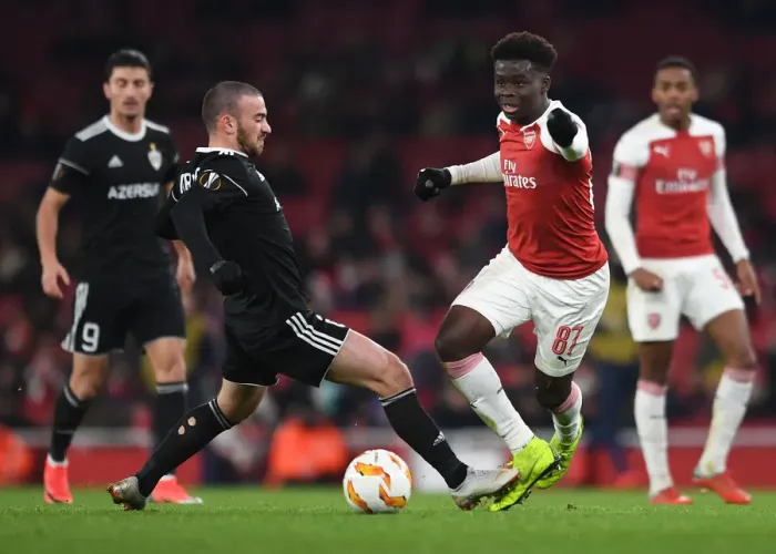 Framed Print : Bukayo Saka vs. Gara Gareyev: Arsenal vs. Qarabag UEFA Europa League Clash