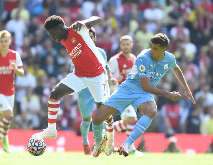 Framed Print : Bukayo Saka vs Joao Cancelo: Manchester City vs Arsenal, Premier League Showdown (2021-22)