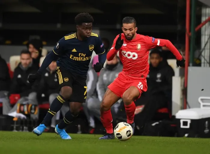 Framed Print : Bukayo Saka vs. Mehdi Carcela: A Europa League Showdown at Standard Liege