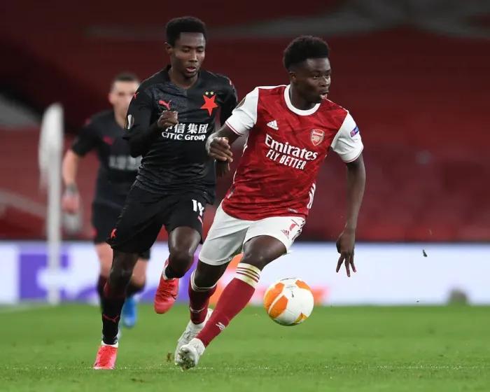 Framed Print : Bukayo Saka vs. Oscar Dorley: A Europa League Showdown in Empty Emirates Stadium Framed Print : Bukayo Saka vs. Oscar Dorley: A Europa League Showdown in Empty Emirates Stadium