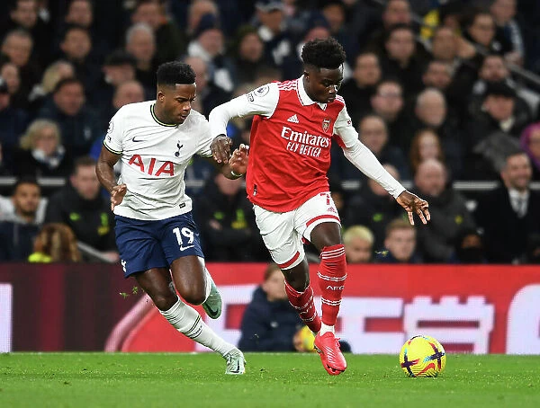 Bukayo Saka vs. Ryan Sessegnon: Battle at the Tottenham Hotspur Stadium - Arsenal vs. Tottenham Premier League Clash (2022-23)
