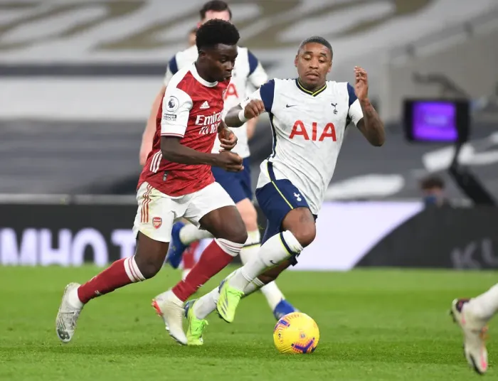 Framed Print : Bukayo Saka vs. Steven Bergwijn: Battle at the Tottenham Hotspur Stadium - Arsenal vs. Tottenham Premier League Clash (2020-21)