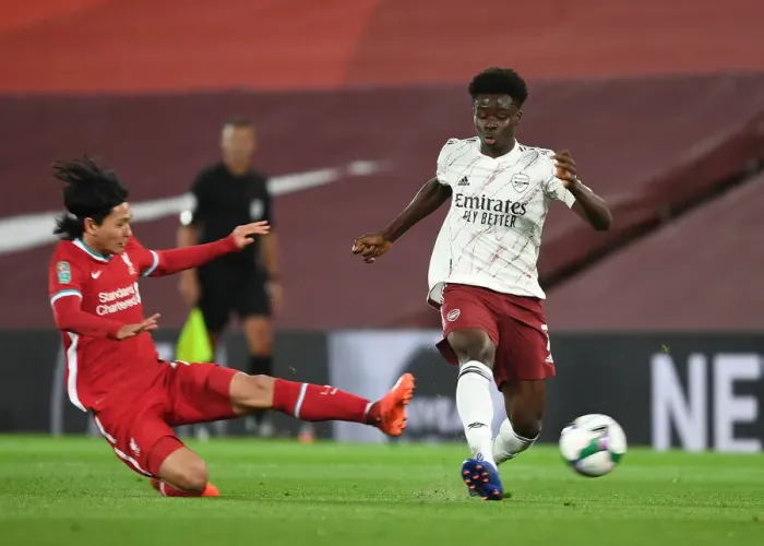 Framed Print : Bukayo Saka vs. Takumi Minamino: Empty Anfield Rivalry - Carabao Cup 2020-21