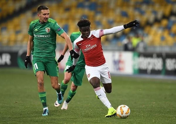 Bukayo Saka vs. Vyacheslav Sharpar: Arsenal's Rising Star Faces Off Against Vorskla Defender in Europa League Clash